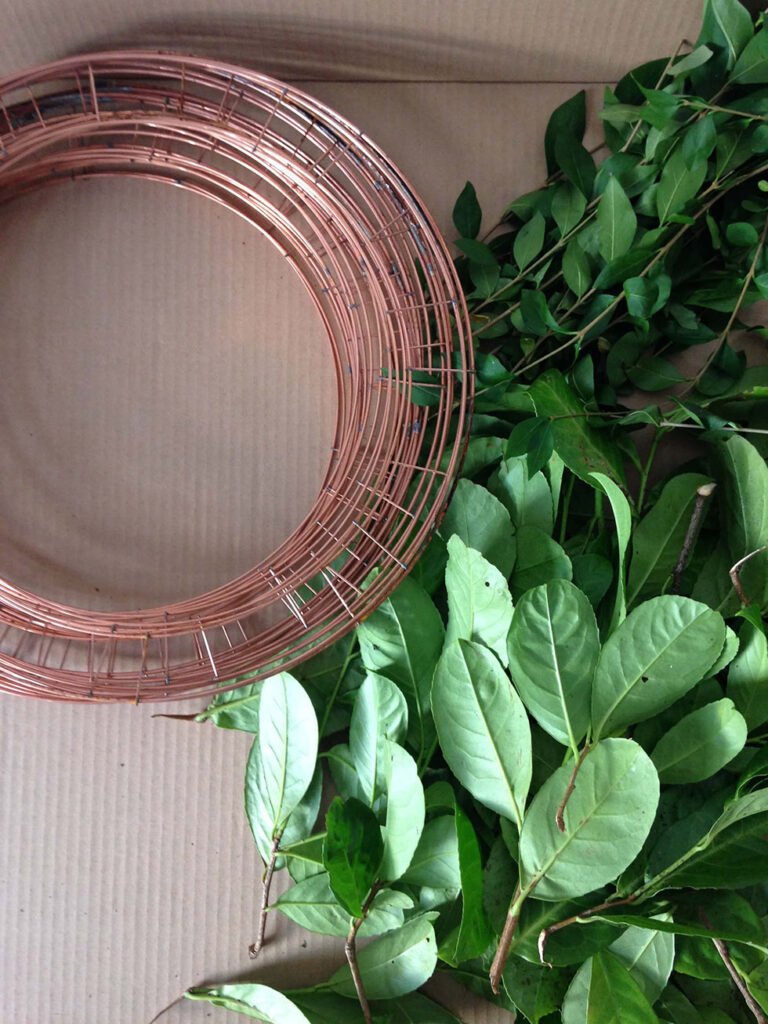 copper wreath rings and greenery