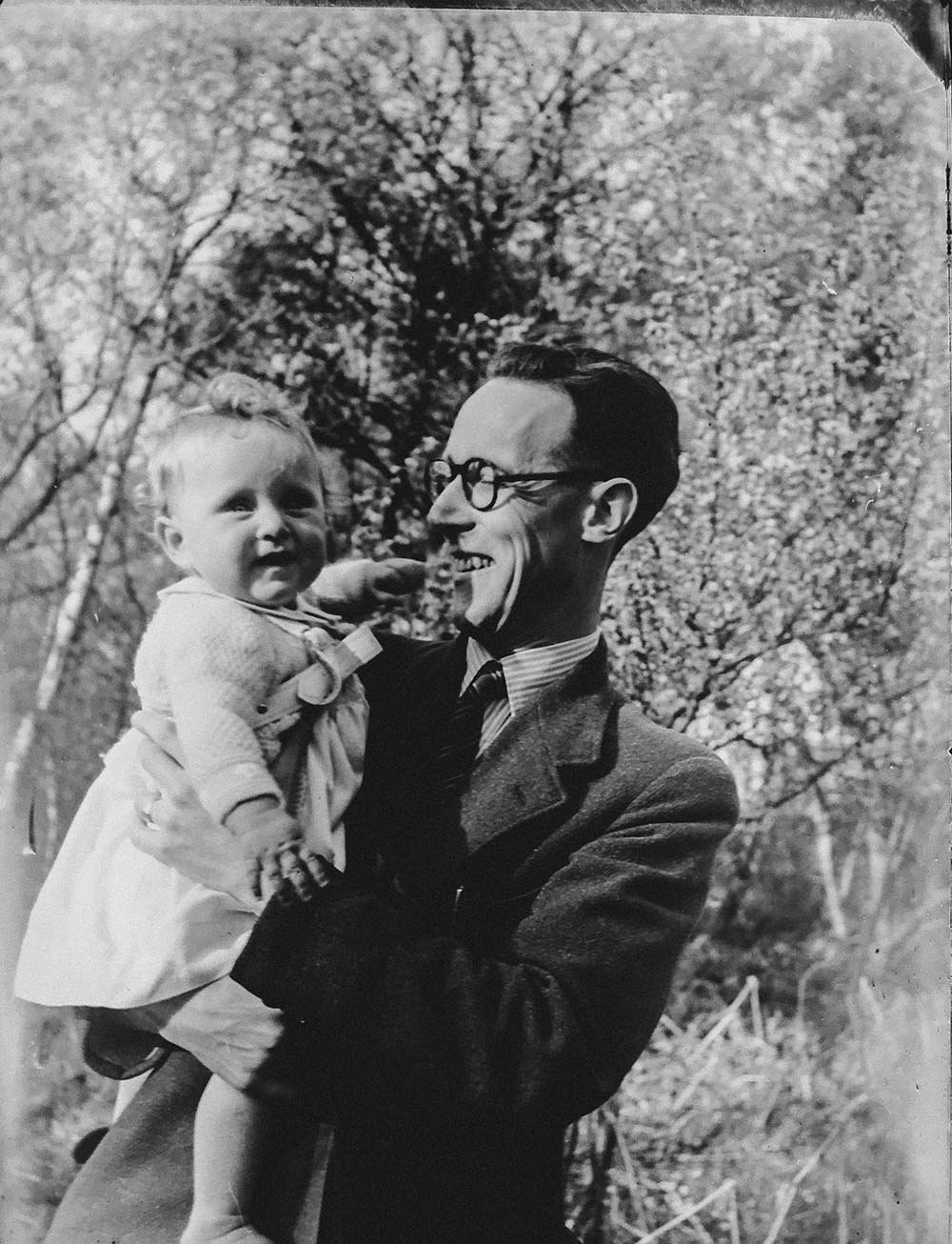 black and white vintage photo of a father and daughter